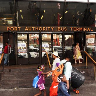 NEW YORK, NY - AUGUST 21: An entrance to the Port Authority Bus Terminal is viewed on August 21, 2014 in New York City. The Port Authority Bus Terminal, which opened in 1950, is New York City's largest bus depot and has long been derided as dirty and inefficient. Leaking ceilings, unsanitary bathrooms, late buses and a long standing problem with the homeless have added to the terminals reputation. While many commuters and transportation advocates are rallying for a new terminal, the Port Authority of New York and New Jersey has announced that they agency plan to spend up to $260 million on maintenance in the coming years. (Photo by Spencer Platt/Getty Images)