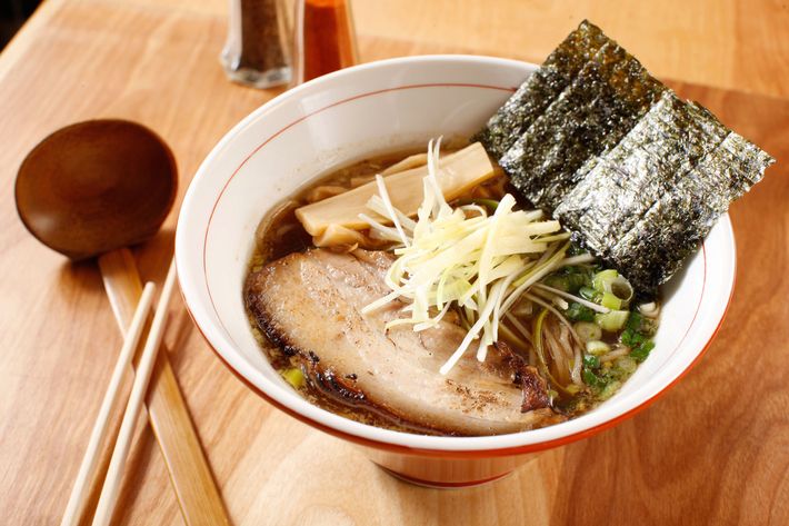 Ginger shoyu ramen with pork belly (or chicken), scallion, seaweed, and bamboo shoots.