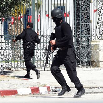 Tunisian security forces secure the area after gunmen attacked Tunis' famed Bardo Museum on March 18, 2015. At least seven foreigners and a Tunisian were killed in an attack by two men armed with assault rifles on the museum, the interior ministry said. AFP PHOTO / FETHI BELAID (Photo credit should read FETHI BELAID/AFP/Getty Images)