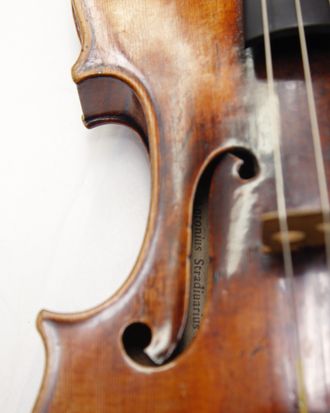 A Stradivarius violin is pictured at the restoration and research laboratory of the Musee de la Musique in Paris, on December 3, 2009. For centuries, historians of music, instrument makers and chemists have been trying to decipher how Antonio Stradivari, working in the small Italian town of Cremona three centuries ago, was able to make violins whose acoustic qualities have never been surpassed. According to a French-German study published on December 4, 2009, on five violins stored at the Musee de la Musique (Cit? de la Musique), the varnish applied on the violins had red pigments added. AFP PHOTO PATRICK KOVARIK (Photo credit should read PATRICK KOVARIK/AFP/Getty Images)