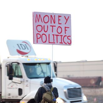 PORTLAND, OR - DECEMBER 12: A protester participating in the 