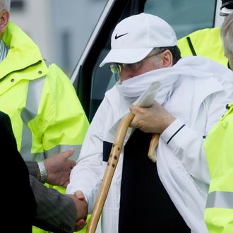 GLASGOW, SCOTLAND - AUGUST 20: Lockerbie bomber Abdelbaset Ali al-Megrahi arrives at Glasgow airport to baord a plane after arriving from Greenock Prison on August 20, 2009 in Glasgow, Scotland. Abdelbaset ali al-Megrahi had been serving a life sentence for the 1988 Pan-AM flight 103 Lockerbie bombing, which killed 270 people. Megrahi, who is terminally ill with prostate cancer, served eight years of a life sentence and following today's decision, has been released on compassionate grounds to go home to spend his remaining days with his family in Libya. (Photo by Danny Lawson - Pool/Getty Images) *** Local Caption *** Abdelbaset Ali al-Megrahi