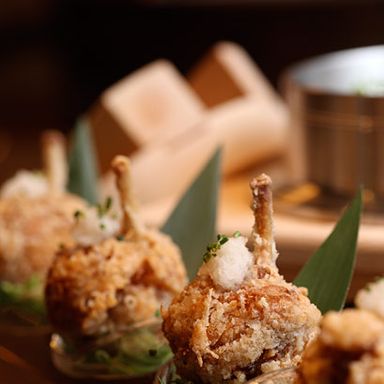 Tatsuta: Marinated and fried chicken wings with tangy greated radish.