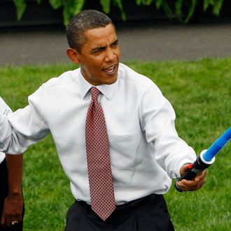 WASHINGTON - SEPTEMBER 16: U.S. President Barack Obama jokingly attacks Olympic fencer Tim Morehouse during a fencing demonstration on the South Lawn of the White House promoting the city of Chicago’s bid for the 2016 Summer Olympics September 16, 2009 in Washington, DC. Obama joined Chicago Mayor Richard Daley, members of the USOC, and representatives from the Chicago2016 group during the event. (Photo by Win McNamee/Getty Images) *** Local Caption *** Barack Obama