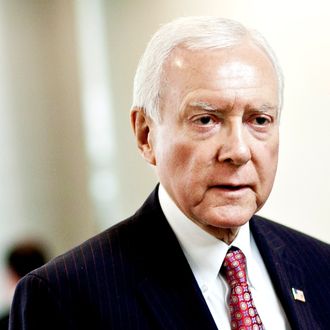 U.S. Sen. Orrin Hatch (R-UT) heads to a weekly policy meeting at the Capitol on March 20, 2012 in Washington, DC. The stage is being set for a fresh budget battle after the House GOP's plan was announced today amid calls from Democrats that their plan is already in place in the form of last year's Budget Control Act.