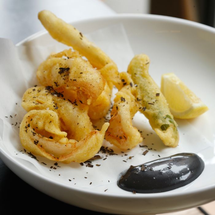 Fried squid, young onion, basil.