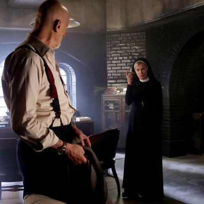 AMERICAN HORROR STORY Nor'easter -- Episode 203, Wednesday, October 31, 10:00 pm e/p) -- Pictured: (L-R) James Cromwell as Dr. Arthur Arden, Jessica Lange as Sister Jude