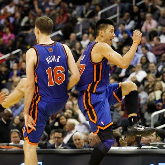 Jeremy Lin #17 of the New York Knicks and Steve Novak #16 celebrate during a timeout against the Washington Wizards during the second half at Verizon Center on February 8, 2012 in Washington, DC.