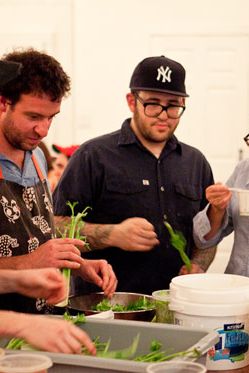 Chef Hugue Dufour (middle-left), Sarah Obraitis (right), and the M. Wells team.