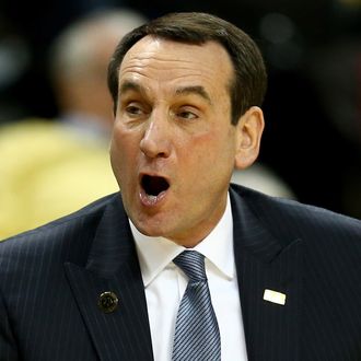 Head coach Mike Krzyzewski of the Duke Blue Devils reacts to a call during their game against the Wake Forest Demon Deacons at Joel Coliseum on March 5, 2014 in Winston-Salem, North Carolina. 