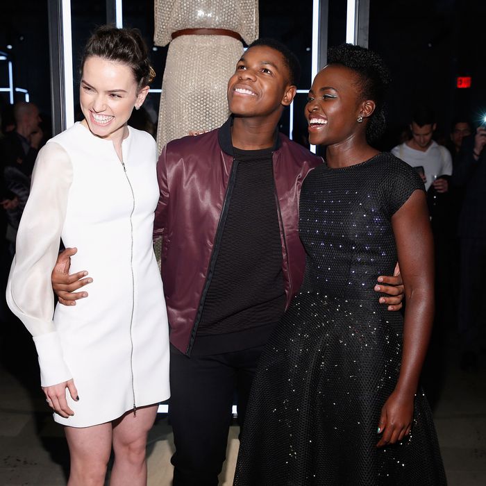 Daisy Ridley, Lupita Nyong'o, and John Boyega at the charity event <em>Star Wars</em> 