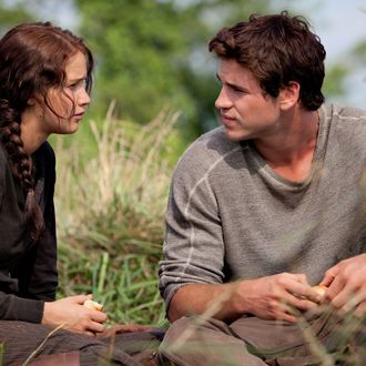 Katniss Everdeen (Jennifer Lawrence) and Gale Hawthorne (Liam Hemsworth) in THE HUNGER GAMES.