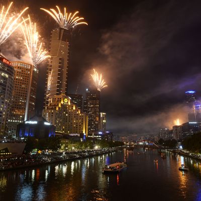 Fireworks over Melbourne skyline and Yarra River during New Years Eve fireworks on December 31, 2013 in Melbourne, Australia. 