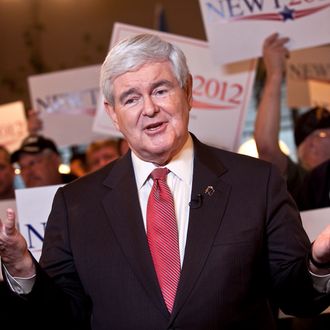 SPARTANBURG, SC - JANUARY 21: Republican presidential candidate, former Speaker of the House of Representatives Newt Gingrich speaks during a live television interview during a campaign stop at the Grapevine Restaurant on January 21, 2012 in Spartanburg, South Carolina. Voters in South Carolina will head to the polls today to vote in the primary election for the U.S. presidential candidate. (Photo by John W. Adkisson/Getty Images)