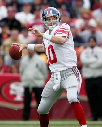 Eli Manning, #10 of the New York Giants prepare to pass the ball during a game against the San Francisco 49ers at Monster Park November 6, 2005 in San Francisco. The Giants defeated the 49ers 24-6.