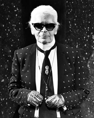 Fashion designer Karl Lagerfeld, who helped grow Chanel brand, has