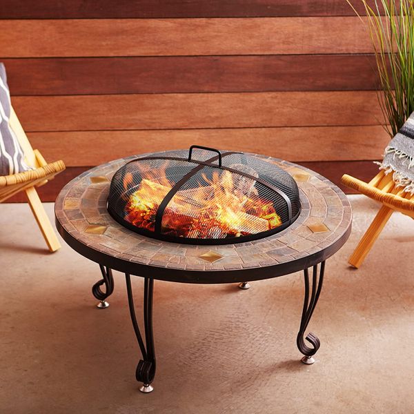 AmazonBasics 34-Inch Natural Stone Firepit with Copper Accents