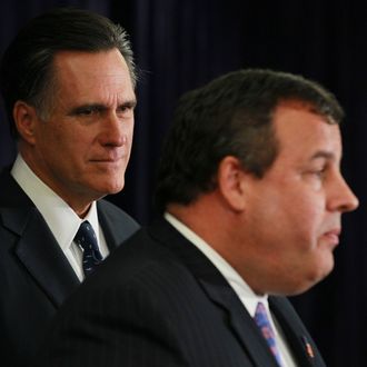 LEBANON, NH - OCTOBER 11: Former Massachusetts Gov. and Republican presidential hopeful Mitt Romney (L) looks on as he receives and endorsement from NJ Governor Chris Christie (R) on October 11, 2011 in Lebanon, New Hampshire. Romney is scheduled to meet other GOP candidates for a debate at Dartmouth College later this evening. (Photo by Justin Sullivan/Getty Images)
