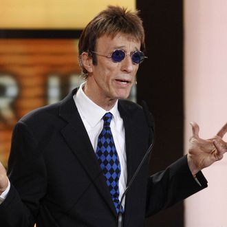 British musician Robin Gibb speaks during the awardings of the Goldene Kamera 2011 (golden camera media prize) of the Axel Springer Verlag publishing house on February 5, 2010 in Berlin. AFP PHOTO POOL TOBIAS SCHWARZ (Photo credit should read TOBIAS SCHWARZ/AFP/Getty Images)