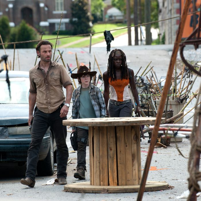 Rick Grimes (Andrew Lincoln), Carl Grimes (Chandler Riggs) and Michonne (Danai Gurira) - The Walking Dead - Season 3, Episode 12