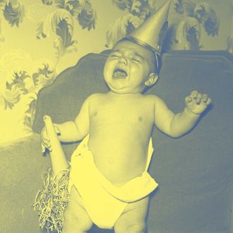 Five-month-old Louis Acerra, of Maspeth, LI, rings in the New Year with a lusty mowl. It isn't that the outlook for 1947 is so bad; it's just he wants to get his quota of crying done before 1946 bows out. 