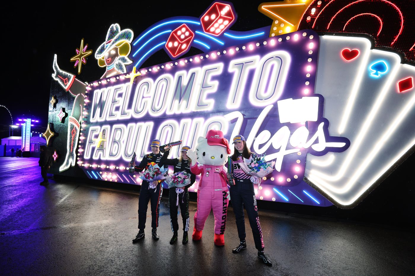 F1 Academy racers with Hello Kitty at the Formula 1 Vegas Grand Prix