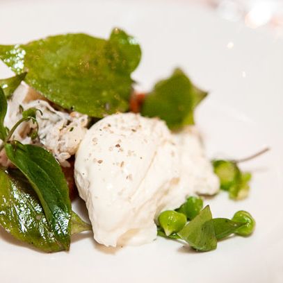 Dungeness crab salad on ramp focaccia with n'duja, miner's lettuce, pressed chickpeas and butter pudding (Chef Kahan).