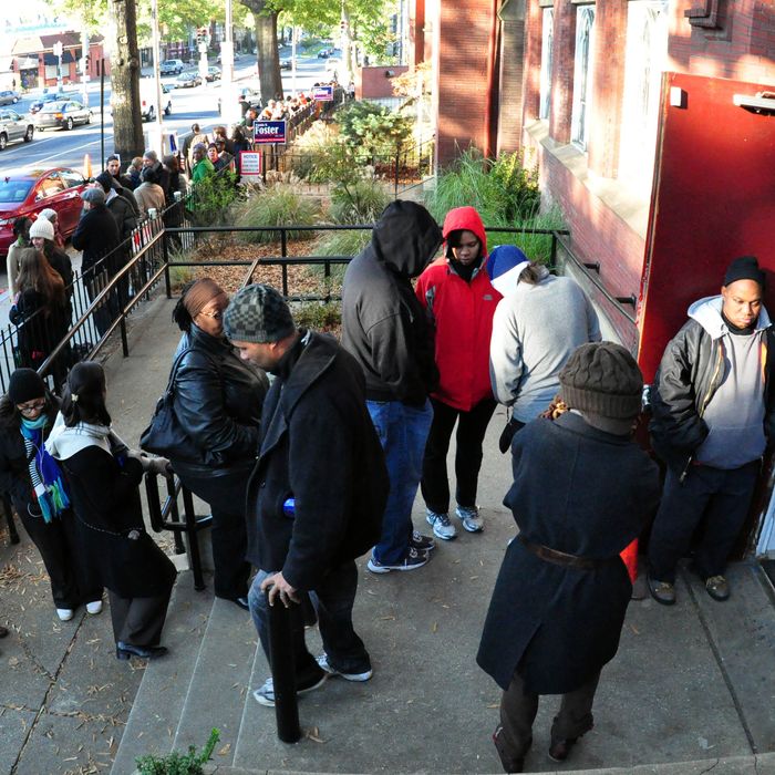 A long line of voters is seen outside Mt.Bethel Baptist Church in Washington, DC on November 6, 2012 as Americans headed to the polls Tuesday after a burst of last-minute campaigning by President Barack Obama and Mitt Romney in a nail-biting contest unlikely to heal a deeply polarized nation.