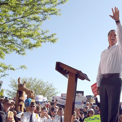 Massachusetts Gov. Mitt Romney waves during a campaign rally at Alice Pleasant Park on May 29, 2012 in Craig, Colorado. Mitt Romney will campaign in Colorado and Las Vegas, Nevada.