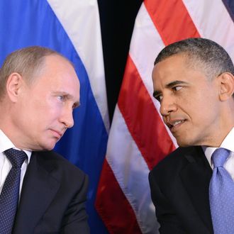 US President Barack Obama (R) listens to Russian President Vladimir Putin after their bilateral meeting in Los Cabos, Mexico on June 18, 2012 on the sidelines of the G20 summit. Obama and President Vladimir Putin met Monday, for the first time since the Russian leader's return to the presidency, for talks overshadowed by a row over Syria. The closely watched meeting opened half-an-hour late on the sidelines of the G20 summit of developed and developing nations, as the US leader sought to preserve his 