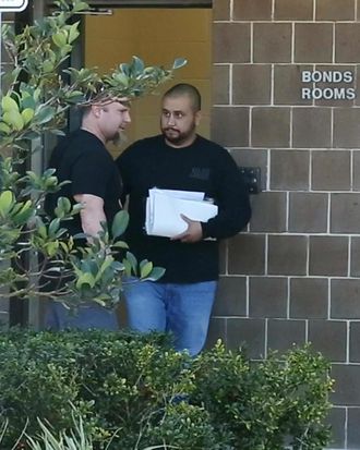 George Zimmerman walks out of the Seminole County Jail after a first appearance at the Seminole County Courthouse in Sanford, Fla., on Saturday, Jan. 10, 2015. Zimmerman was charged with aggravated assault with a weapon in an incident where he allegedly threw a wine bottle.