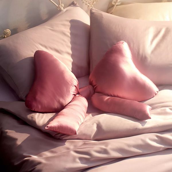 Urban Outfitters Big Bow Satin Throw Pillow