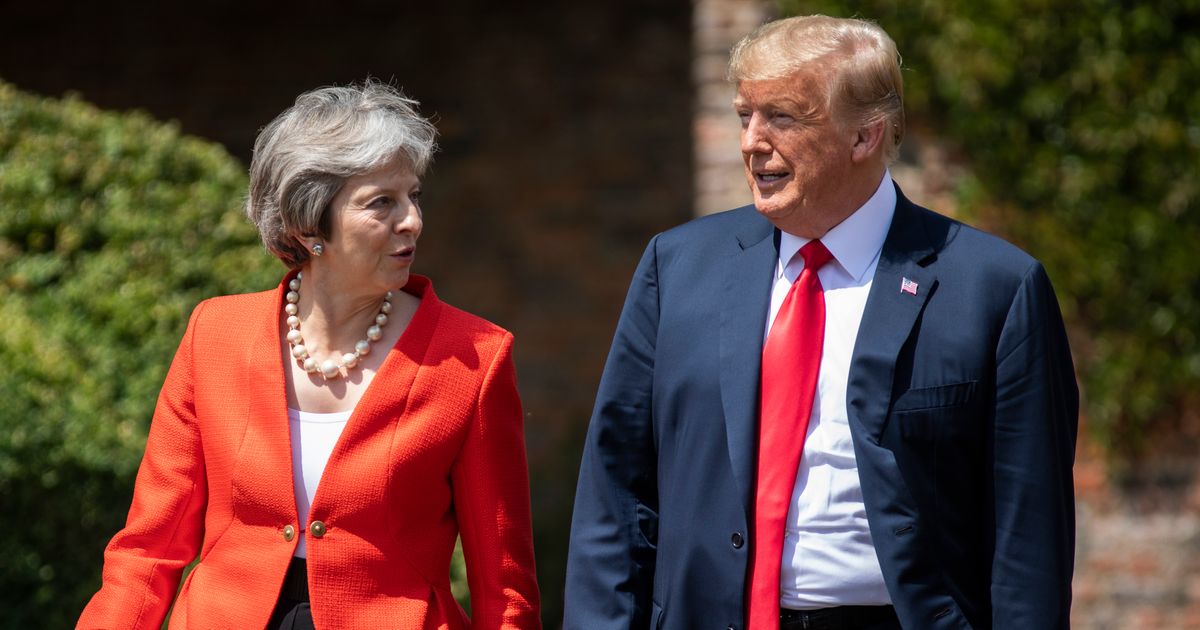 May Says Trump Told Her To Sue E.U. Over Brexit