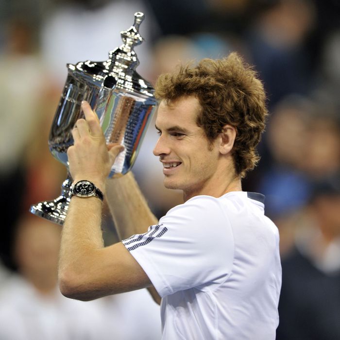 Andy Murray of Britain holds the trophy after his 7-6, 7-5, 2-6, 3-6, 6-2 win over Novak Djokovic of Serbia during their men's singles final match at the 2012 US Open tennis tournament September 10, 2012 in New York.