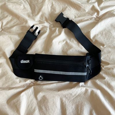 Dimok Water Resistant Runner’s Belt Fanny Pack Review | The Strategist