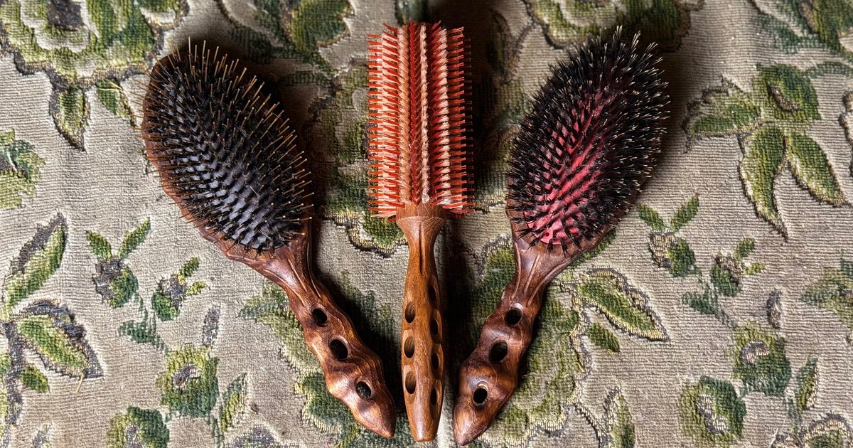 YS Park hairbrush on white background