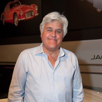 LOS ANGELES, CA - APRIL 09: Comedian Jay Leno attends the Worlds Greatest Sports Coupe exhibit opening celebration with Jaguar at the Petersen Automotive Museum on April 9, 2014 in Los Angeles, California. (Photo by Angela Weiss/Getty Images for Petersen Automotive Museum)