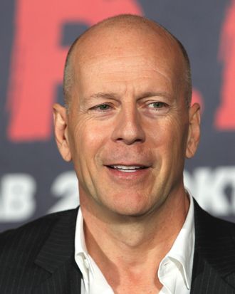 Bruce Willis, bald and proud.