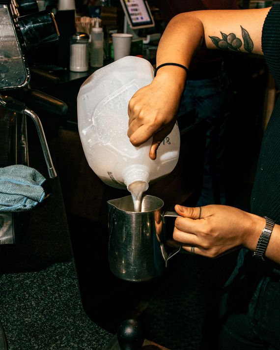 The Terrible Etiquette Mistake Everyone Makes With Hot Cafe Drinks