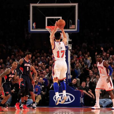 Jeremy Lin #17 of the New York Knicks shoots a three pointer against the Atlanta Hawks at Madison Square Garden on February 22, 2012 in New York City.