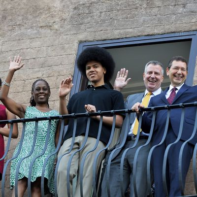 The mayor of Rome Ignazio Marino (R) poses with New York city mayor Bill de Blasio, his wife Chirlane McCray (2ndL) and their children Dante and Chiara at the balcony of Rome's city hall before their meeting on July 20, 2014. AFP PHOTO / ANDREAS SOLARO (Photo credit should read ANDREAS SOLARO/AFP/Getty Images)