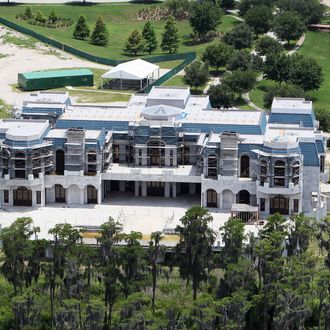 Aerial pictures of the biggest home in America - being built over 10 acres in Windermere, Florida, and modeled after France's historic Palace of Versailles - which is the centrepiece of an award-winning documentary opening this week and now a bitter dispute. The documentary, 'Queen of Versailles', is about time share mogul David Siegel, his former beauty queen wife Jackie, and the collapse of their dream home project when the recession hit. As they struggled to complete the gigantic project, they put the unfinished 13-bedroom, 23-bathroom mansion on sale for $75m, then $65m. The movie received rave reviews - as well as a prize at the Sundance Film Festival - as it showed an extravagant take on the implosion of the American Dream, according to reviews. Now, as the movie is about to be released, Mr Siegel has fired off a letter asking for the ending to be changed since he claims his company is healthy and he will now have no problems completing the construction. He is also suing the film makers over what he claims are defamatory statements about his economic situation, according to reports. Photos taken on 4/06/2010.<P>Pictured: house<P><B>Ref: SPL418464 180712 </B><br>Picture by: SDFL / Splash News</P><P><B>Splash News and Pictures</B><br>Los Angeles: 310-821-2666<br>New York: 212-619-2666<br>London: 870-934-2666<br>photodesk@splashnews.com<br></P>