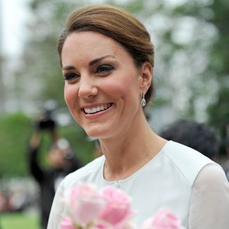 Sept. 14, 2012 - Kuala Lumpur, Malaysia - CATHERINE, the Duchess of Cambridge, smiles as she walks in the garden of KLCC during the Cultural Fair event in Kuala Lumpur. Britain's Prince William and his wife Catherine are visiting Malaysian capital Kuala Lumpur as part of a nine-day Southeast Asian and Pacific tour marking Queen Elizabeth II's Diamond Jubilee. (Credit Image: ? Najjua Zulkefli/ZUMAPRESS.com)