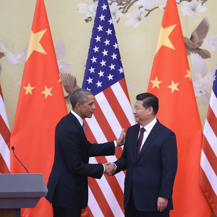 BEIJING, CHINA - NOVEMBER 12: U.S. President Barack Obama (L) shakes hands with Chinese President Xi Jinping (R) after a joint press conference at the Great Hall of People on November 12, 2014 in Beijing, China. U.S. President Barack Obama pays a state visit to China after attending the 22nd Asia-Pacific Economic Cooperation (APEC) Economic Leaders' Meeting. (Photo by Feng Li/Getty Images)