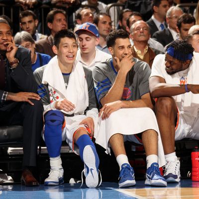 NEW YORK, NY - FEBRUARY 15: Carmelo Anthony #7, Jeremy Lin #17, Landry Fields #2, and Bill Walker #5 of the New York Knicks (L to R) sit on the bench during the game against the on February 15, 2012 at Madison Square Garden in New York City. NOTE TO USER: User expressly acknowledges and agrees that, by downloading and or using this photograph, User is consenting to the terms and conditions of the Getty Images License Agreement. Mandatory Copyright Notice: Copyright 2012 NBAE (Photo by Nathaniel S. Butler/NBAE via Getty Images)