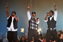 GLASGOW, SCOTLAND - OCTOBER 05: (EXCLUSIVE COVERAGE) (L-R) Wayne Morris, Nathan Morris and Shawn Stockman of Boys II Men perform on stage during the MOBO Awards 2011 at the SECC on October 5, 2011 in Glasgow, Scotland. (Photo by Gareth Cattermole/Getty Images)